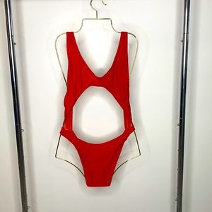 Red one piece cut out swimsuit. Size small